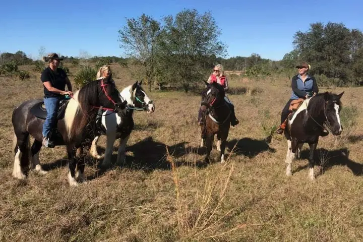 A tour group riding through Alafia state park