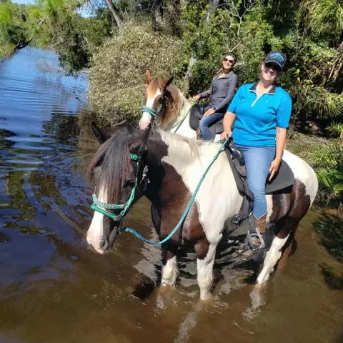 Two women enjoying a trail ride on the Deer Prairie Creek Trail